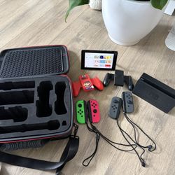 Nintendo Switch + Carrying Case 
