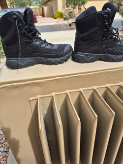 Like  new  , a pair of Under Armour tactical  boots