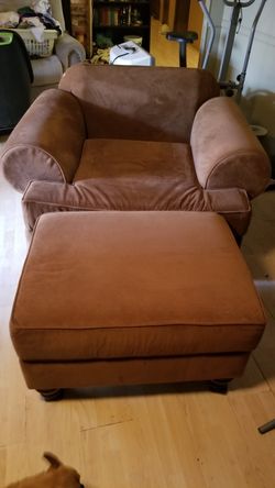 Overstuffed chair and ottoman