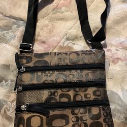 Brand new Crossbody type purse, 9 inches tall by 8 inches wide