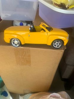 Chevrolet SSR Yellow Diecast Model Car