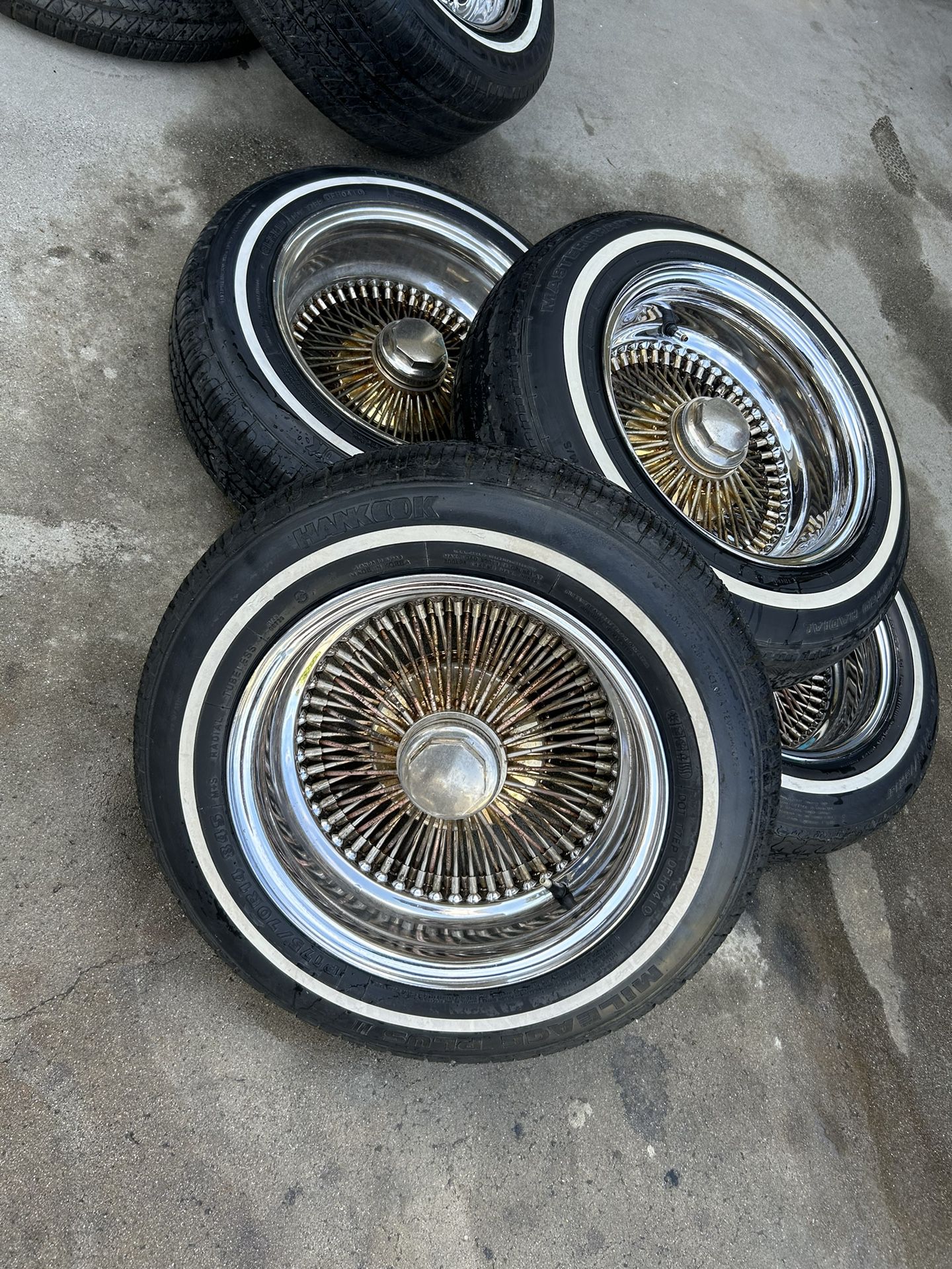 4 WIRE WHEEL TIRES (SERIOUS BUYERS ONLY)