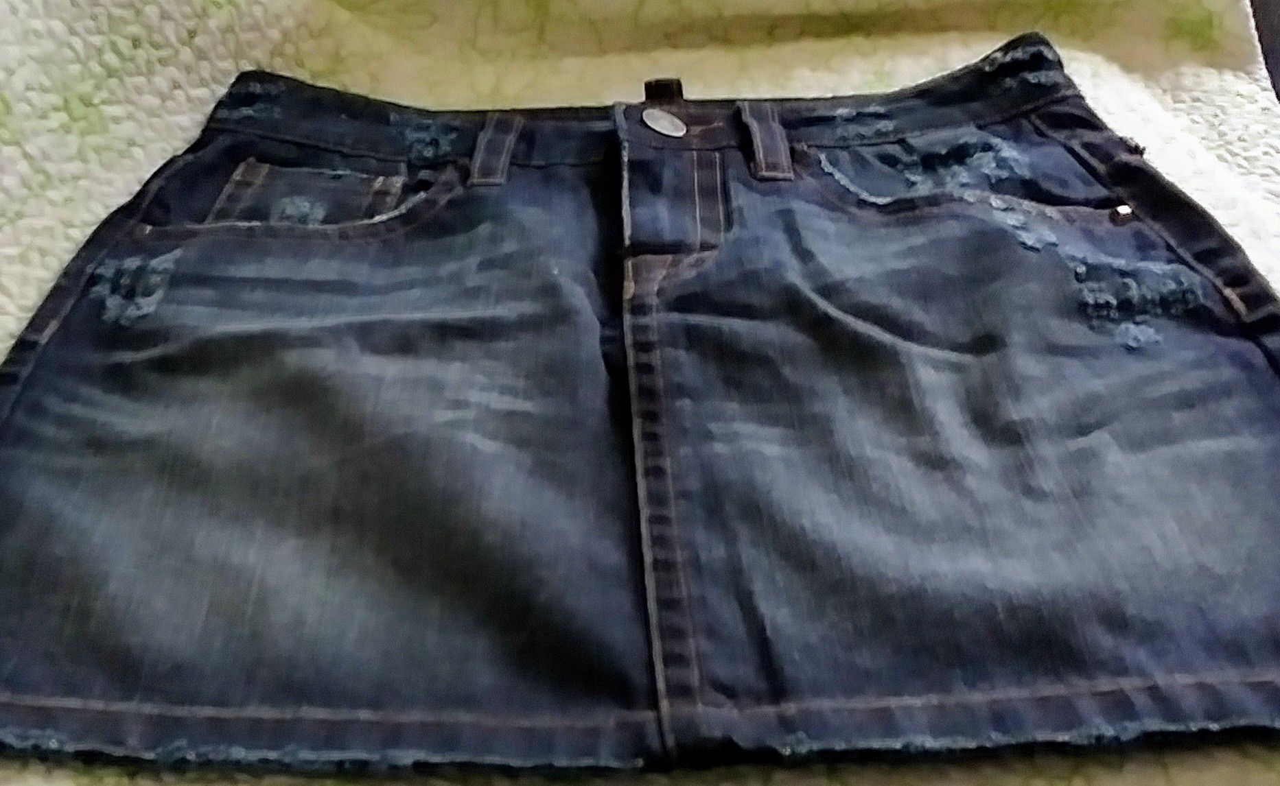 NEW. Vintage Victoria's Secret - London jeans. Distressed Jean mini skirt. Silverstone stud detailing. Size 2