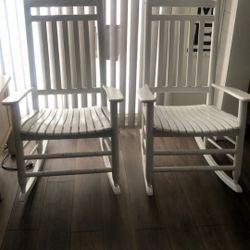 2 WHITE ROCKING CHAIRS