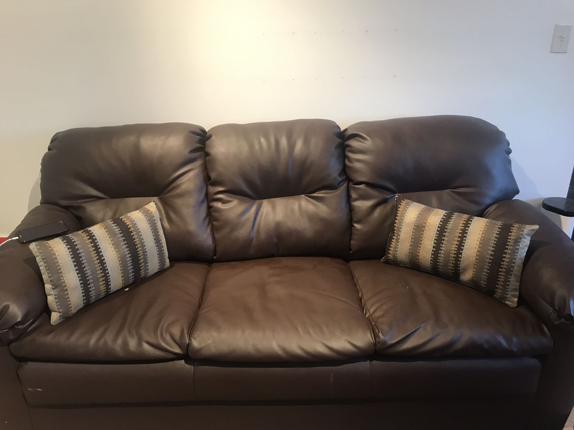 Beautiful brown couches mild stain not noticeable