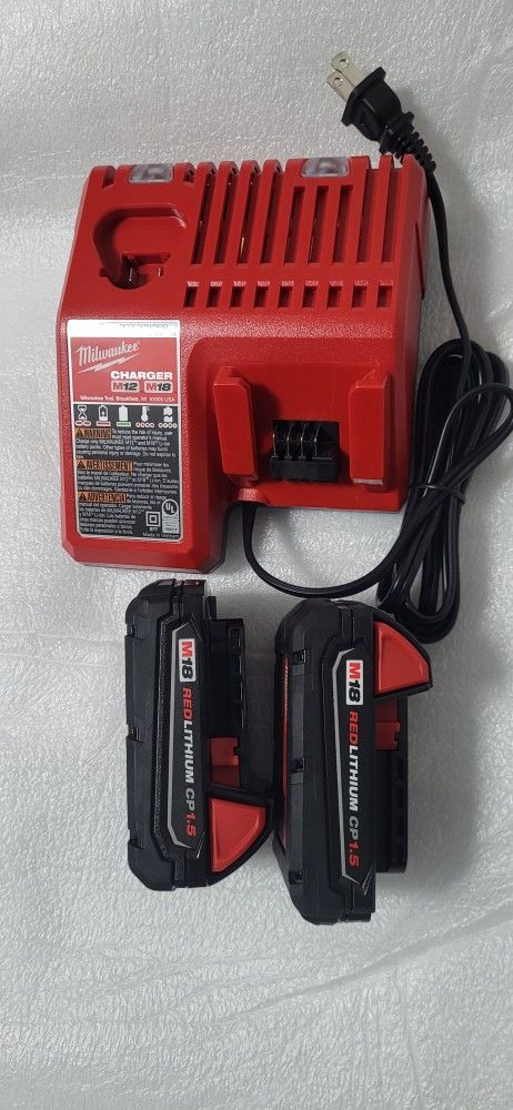 MILWAUKEE M18 BATTERY SET OF TWO PLUS CHARGER NEW