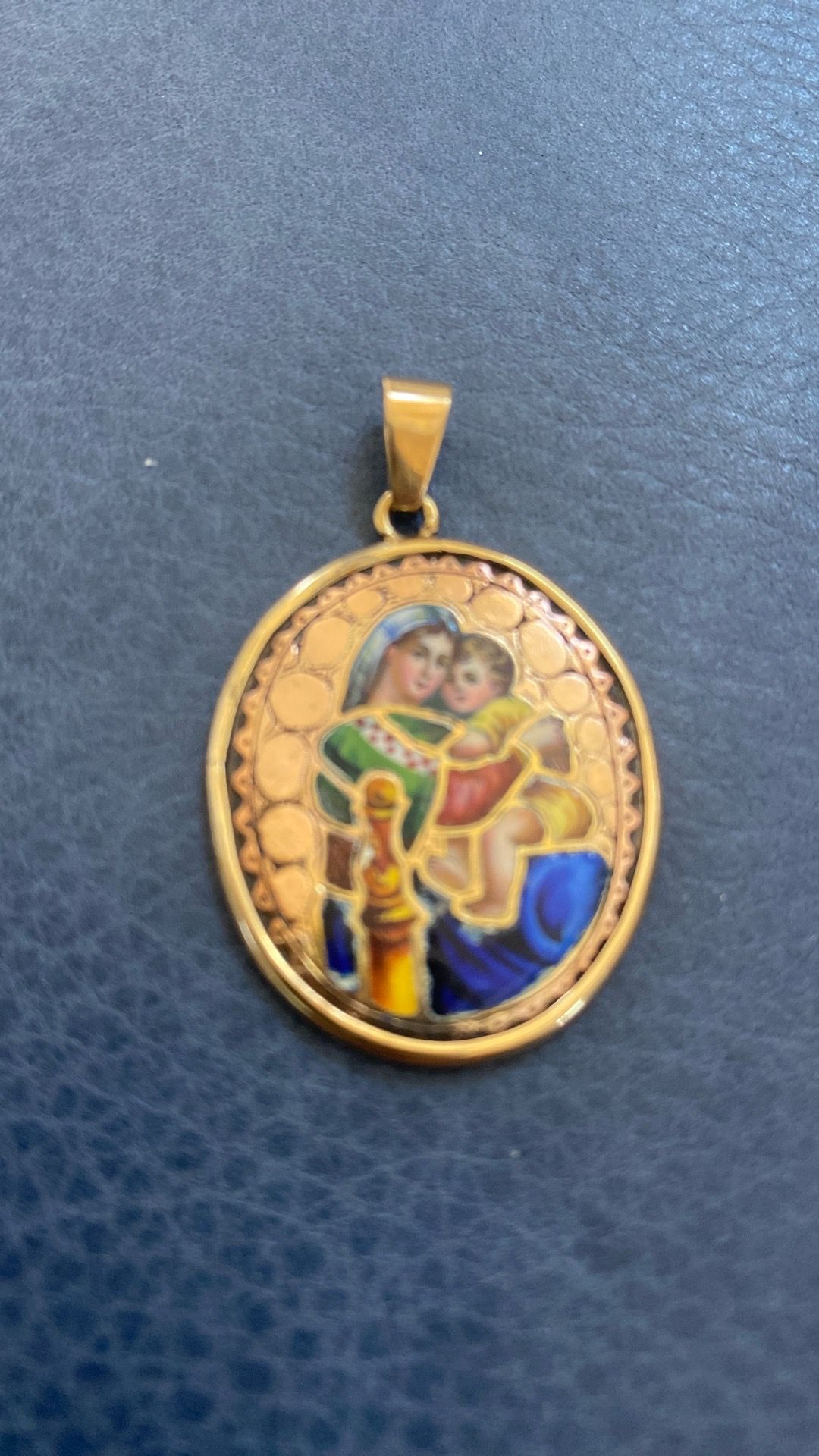 Catholic Vintage German Madonna and Child charm with a colorful enamel or porcelain possible 10k of 14k gold not stamped
