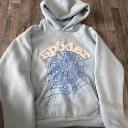 Sky blue sp5der hoodie in a size medium