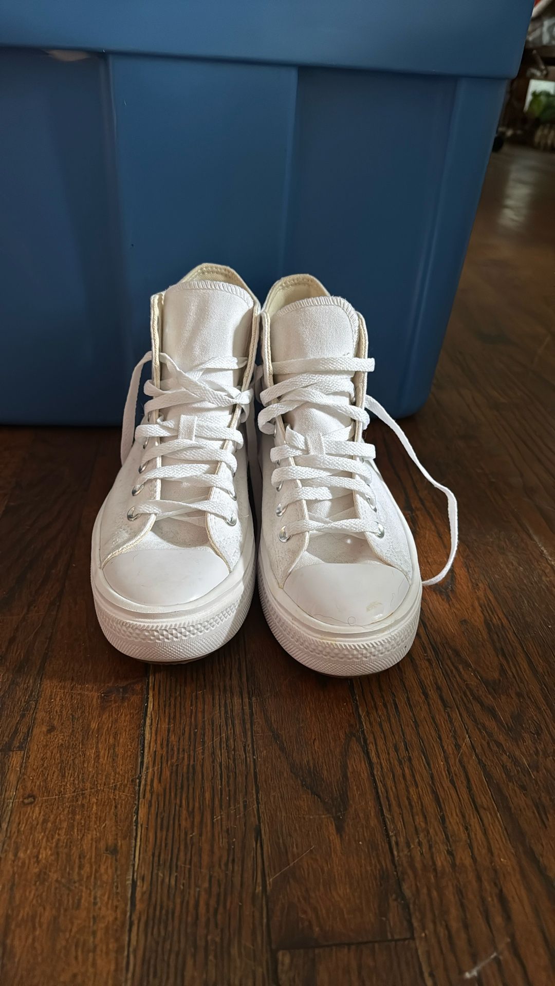 white and black chunky converse