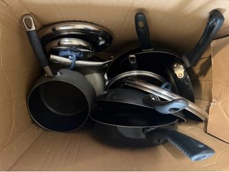 assorted teflon pots/pans and lids