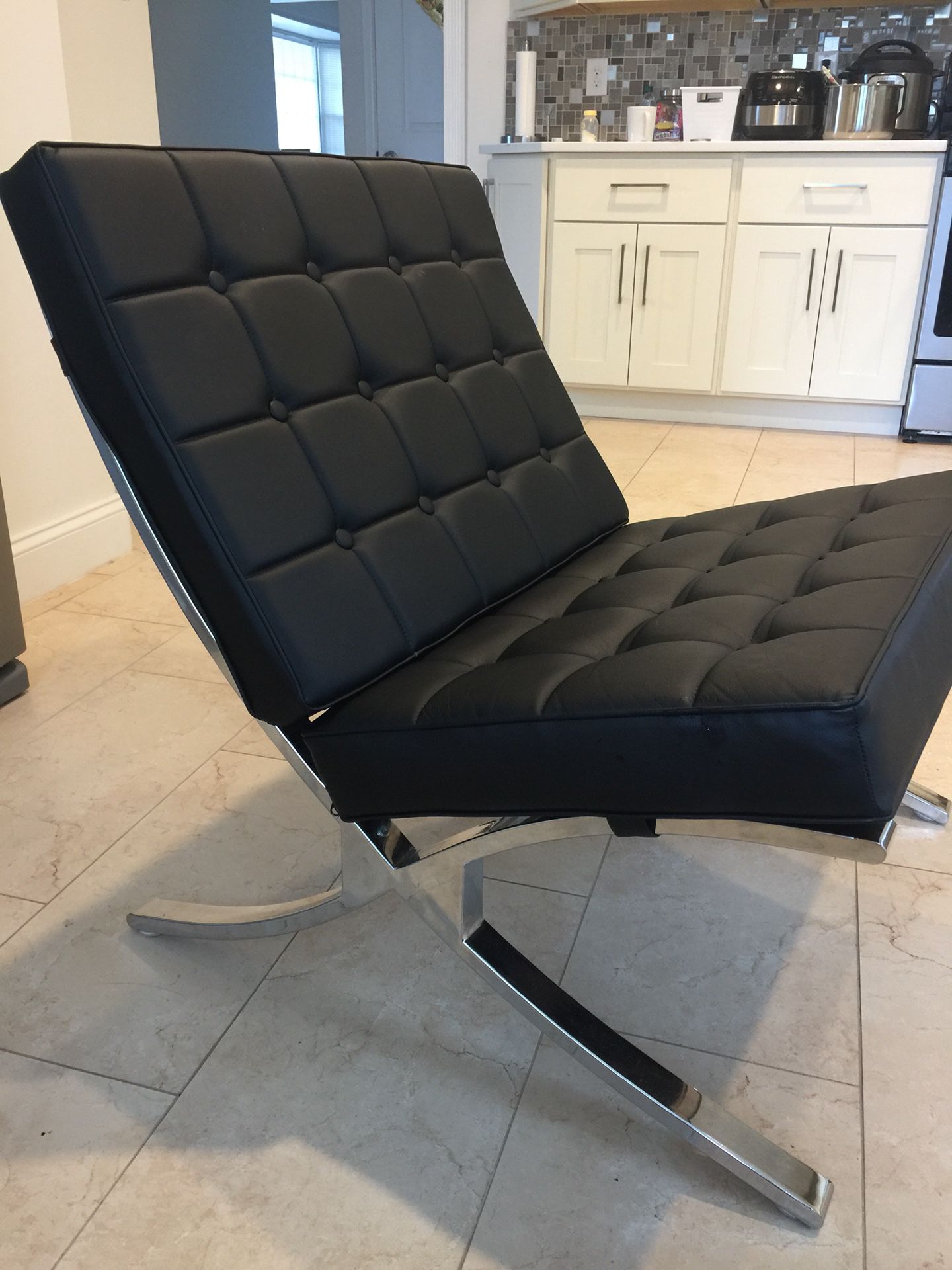 Black leather chair excellent condition.