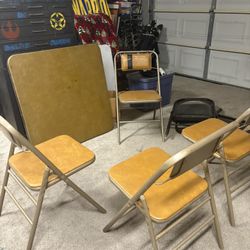 Table With 4 Chairs And 3 Extra Black Folding Chairs All For $40