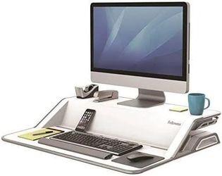 Fellowes Lotus white sit and stand desk. Adjustable height.