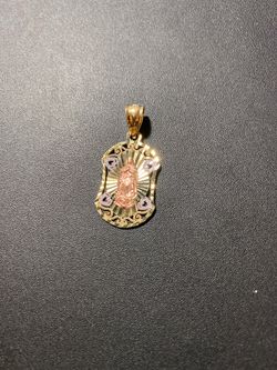 10k real solid gold pendant 1.25” 2.1gr