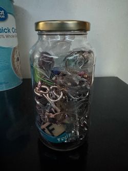 Jar filled with jewelry