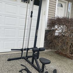 Titan Plate-Loaded Lat Pull Down & Cable Row Machine with some  attachments excellent condition work great,cash only,thanks  Keywords :Weights gym dum