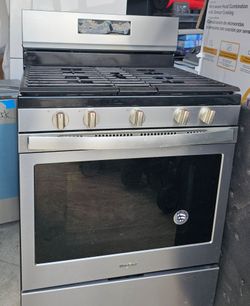 WHIRLPOOL STAINLESS STEEL GAS STOVE......$ 300