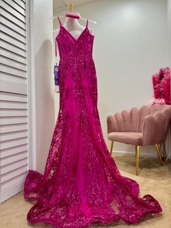 New with Tags, with shawl included,  very Stunning magenta Cinderella Divine J810 prom dress is a size 2