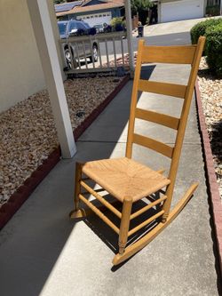 Antique Wooden Rocking Chair With Ladder Back And Woven Seat Bottom