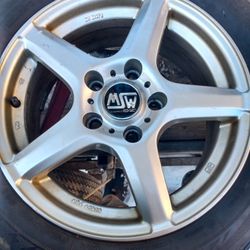 Oz Racing Rims Mounted And Balanced With Bridgestone Snow Tires