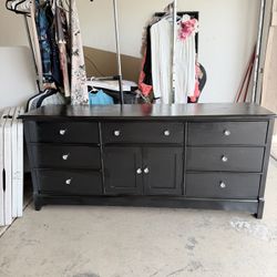 Black dresser good condition all the drawers work fine 71 wide – 31 high – 19 deep