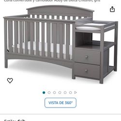 Gray baby crib used like new 