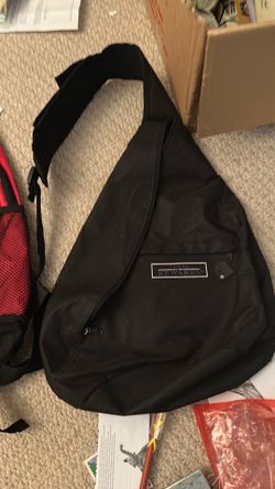 Backpack with separate cellphone connected on the strap regular size