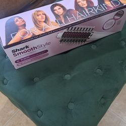 $100Shark
 Smooth style.  Straightener comb & smoother