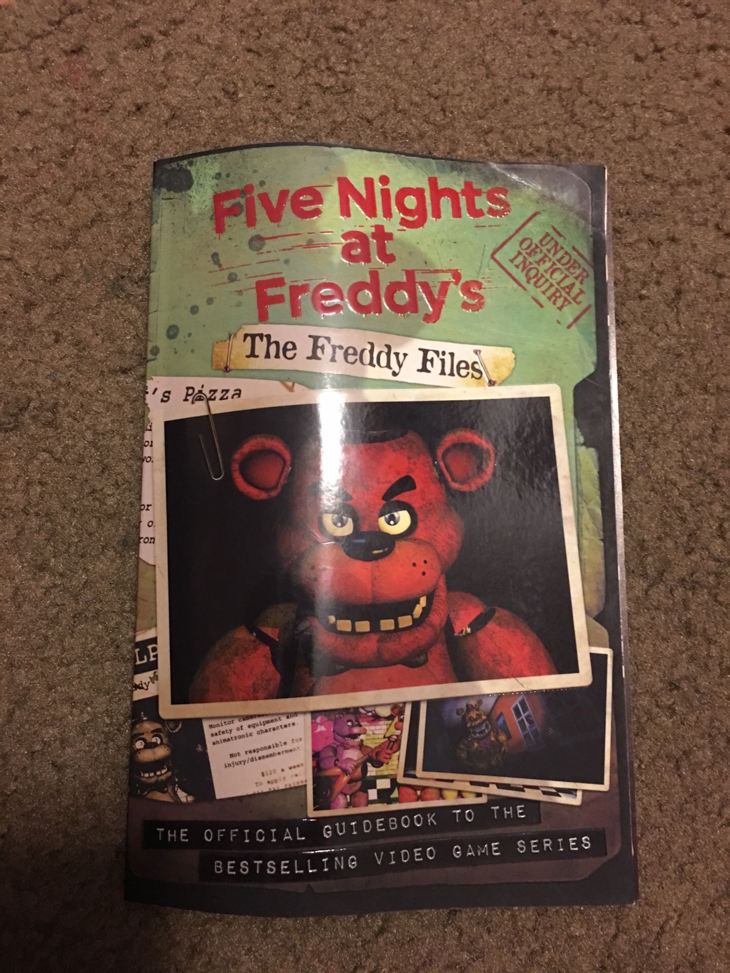 Five nights at Freddy the Freddy files the official guide book to the best selling video game series