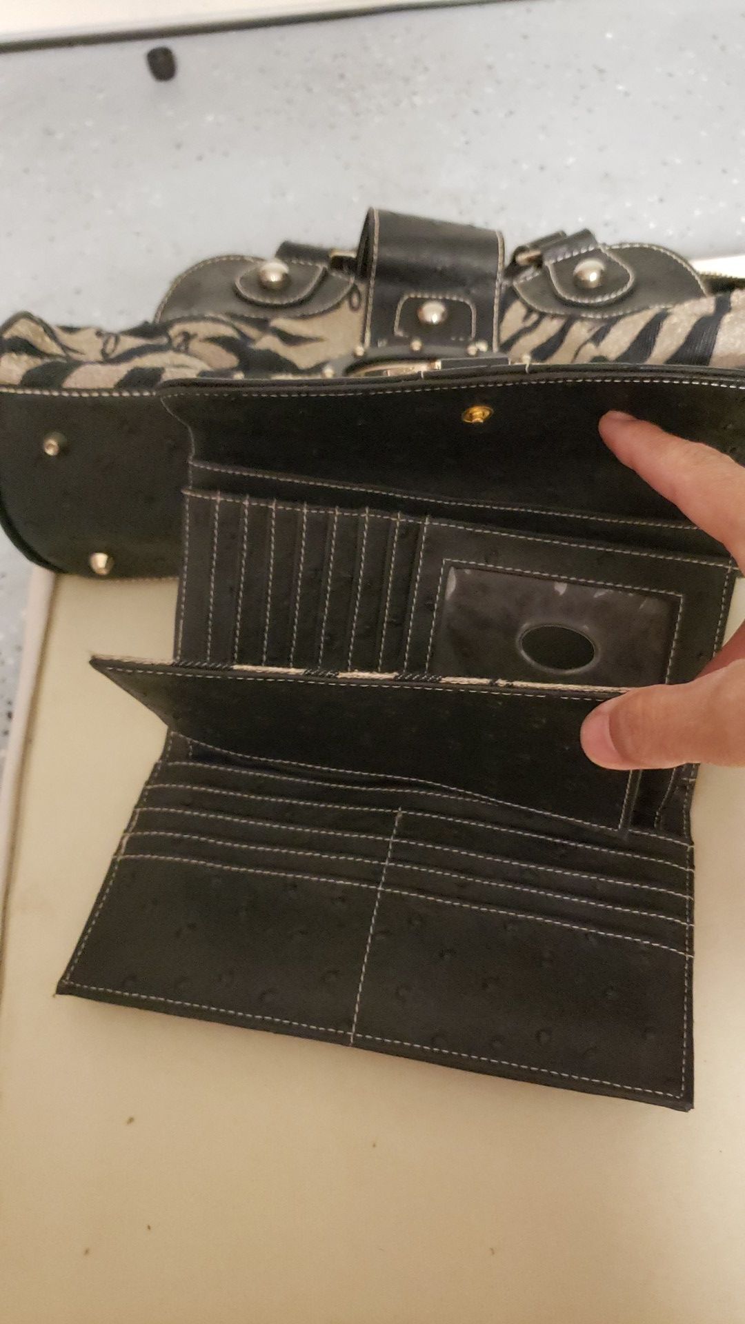 Set of black and tan purse and wallet