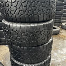 SET OF FOUR LT33x1250r20 FALKEN AT3 TIRES