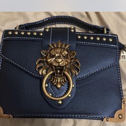 #Black and #gold #lion head bag #lionheadbag #women Original price on eBay as shown $35  black, gold accents, lion head detail, statement bag, designe