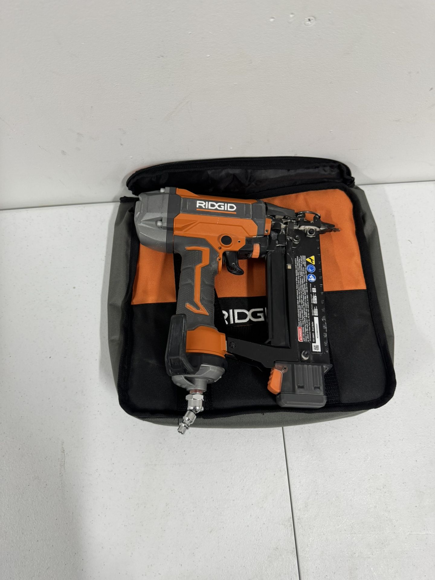 RIDGIT Pneumatic 18-Gauge 2-1/8 in. Brad Nailer with CLEAN DRIVE Technology, and Tool Bag