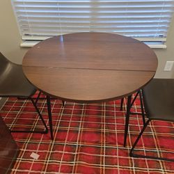 38" round drop leaf dinette table w 2 chairs.