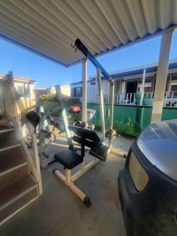 Selling home gym olympic bench press And  a multi-function cable gym machine
