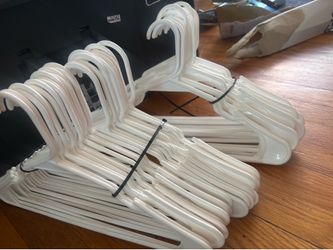 FREE 50 white plastic hangers