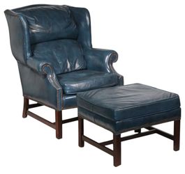 Experience unparalleled relaxation with a Vintage two-piece Classic Leather Wingback Chair & Ottoman