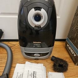 New Cond MIELE. VACUUM WITH ATTACHMENT  , WORKS EXCELLENT 