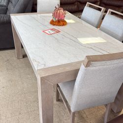 Dinette and four chairs for $1000 brand new