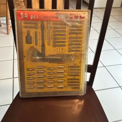 54 pieces, sockets, and screwdriver bits