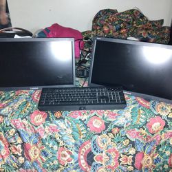 Computer Screens And Keyboard