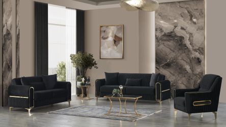 Sleek, vertical detailing sofa with polished gold accents 