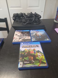 Playstation 4 Pro Console with 2 controllers and multiple games