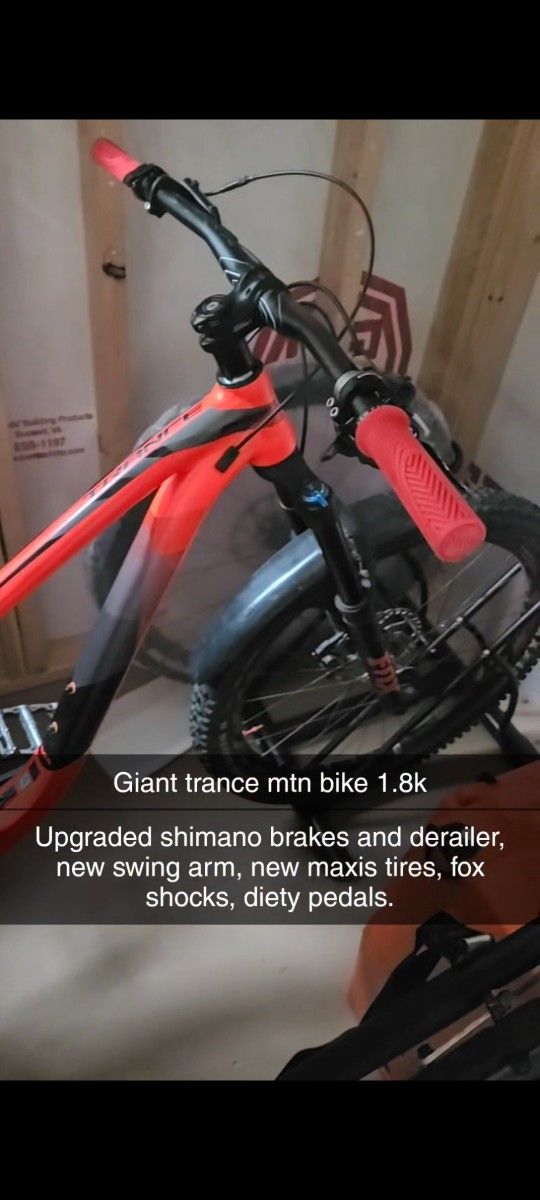 Giant trance mtn bike 1.8k comes with new schwin helmet.