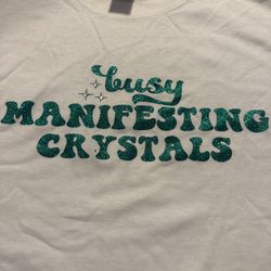 White glittery "Busy Manifesting Crystals" t-shirt