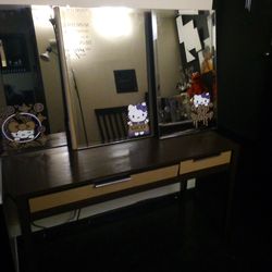 Computer desk with matching tinted mirrors