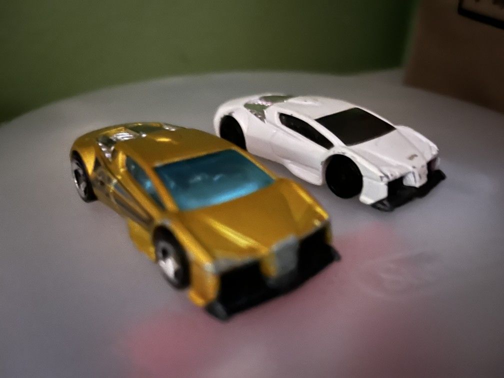Hot Wheels 2007 Zotic Super Car Gold HW Police Patrol 5-Pack Malaysia and
Hot Wheels White Mattel 2002 Zotic 1:64 Loose project car