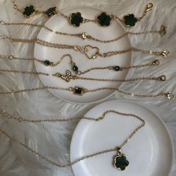 Beautiful elegant green/faux gold necklace and SIX bracelets