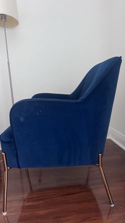 Blue velvet armchair