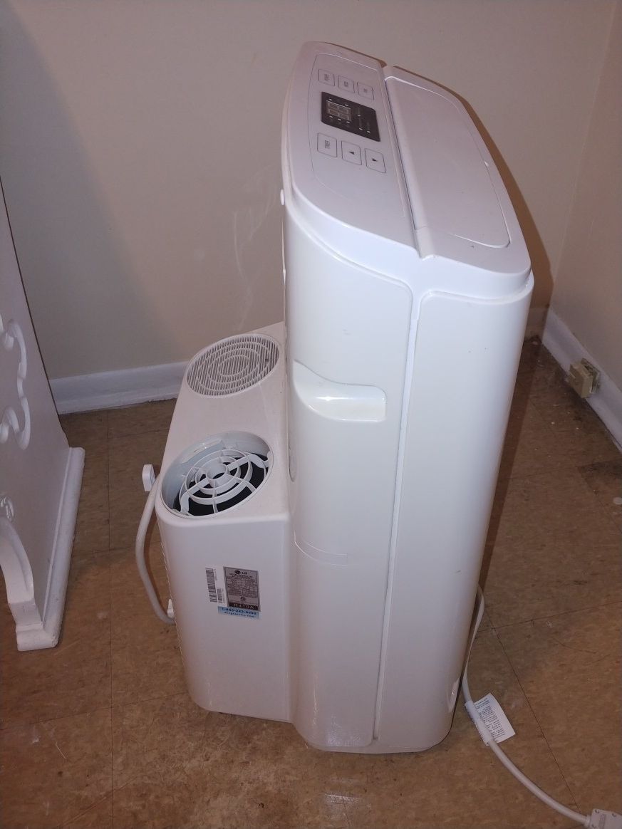 LG Portable Air Conditioner and Dehumidifier. Powerful Combination. 11,000 BTUs. Has a remote.